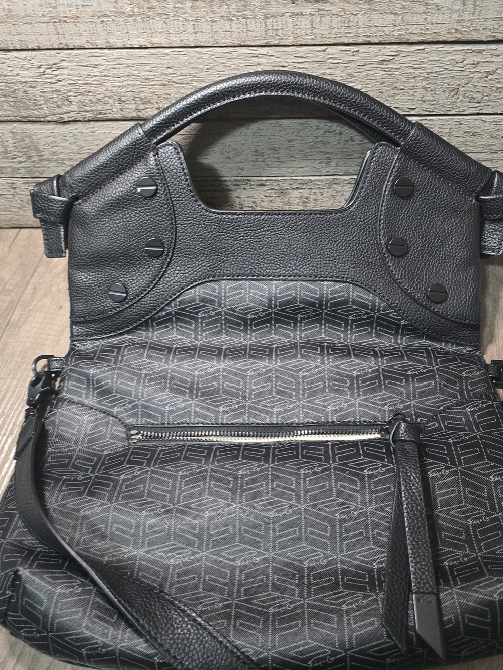 Foley + Corinna Lady Tote featuring a fold-over design.